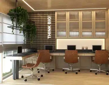 Ambiente de arquitetura corporativa com estações de trabalho organizadas, iluminação estratégica e planejamento de ambientes voltado para produtividade.